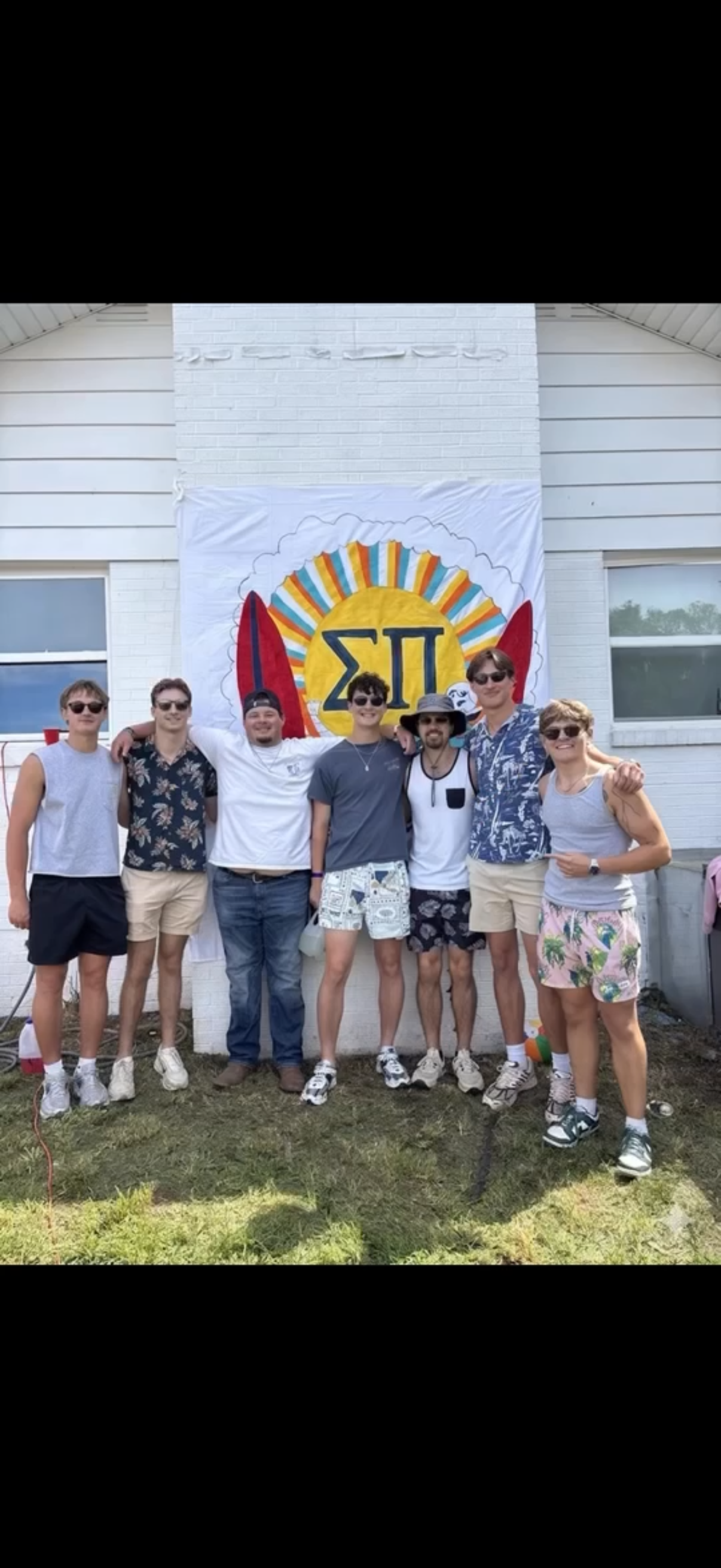 Brothers together at the Sigma Pi house